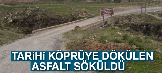 Tarihi köprüye dökülen asfalt söküldü