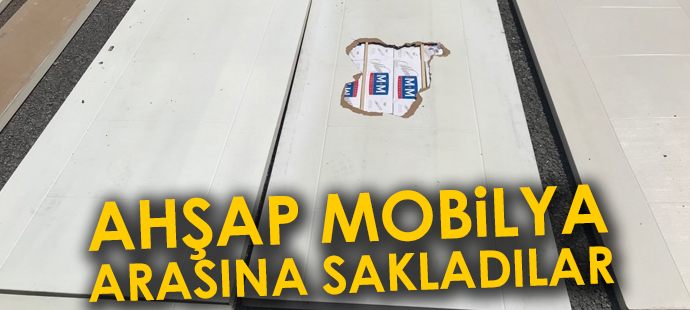 Ahşap mobilya arasında 5 bin 500 paket kaçak sigara çıktı